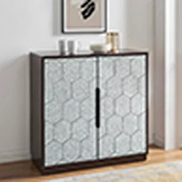 Modern sideboard cabinet with geometric patterned doors and dark wood frame in hallway