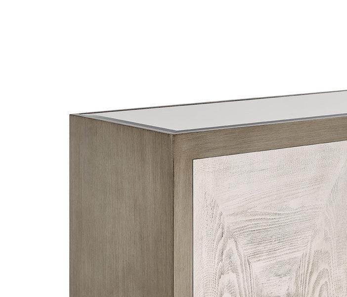 Close-up of wooden sideboard cabinet corner with light wood grain panel and glass top