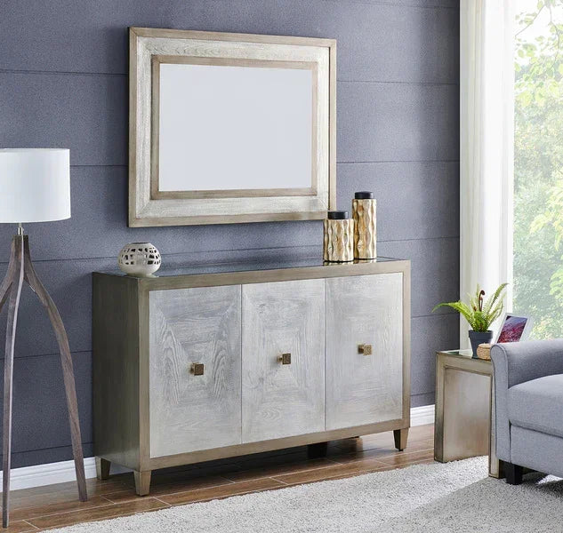 Modern wood sideboard with three doors and metallic trim in living room