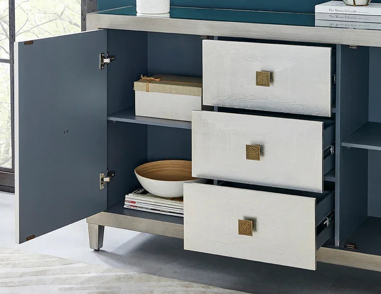 Sideboard with white drawers, blue shelves, open cabinet door, and decorative storage box