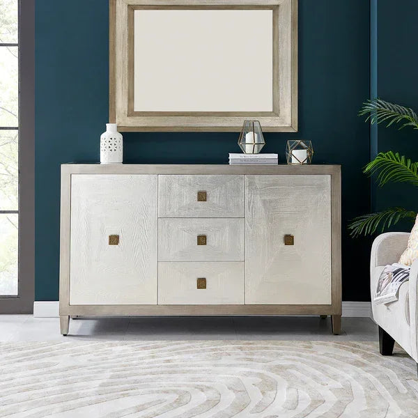 Contemporary white sideboard with gold handles in modern living room setting