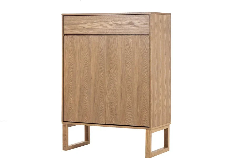 Oak wood sideboard cabinet with two doors and elevated legs, shown from front angle