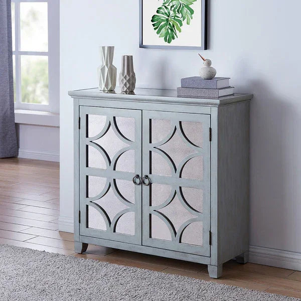 Light grey storage cabinet with mirrored doors and geometric design in modern living room