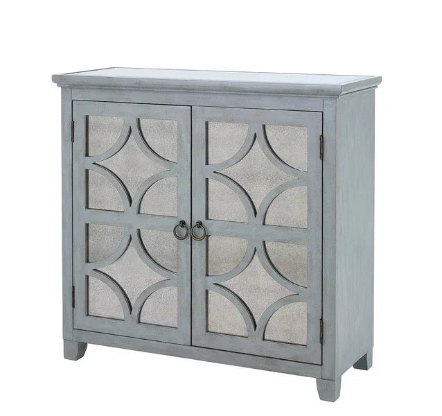 Grey wooden storage cabinet with mirrored geometric doors and metal handles