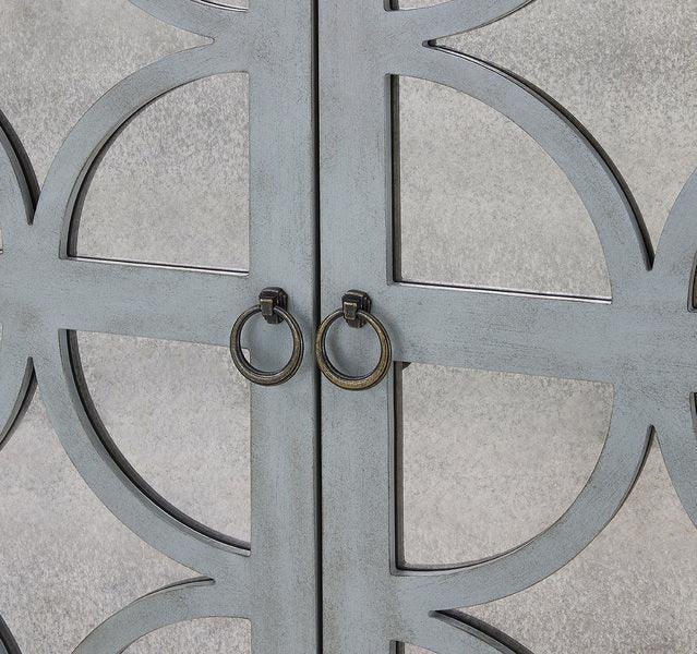 Cabinet doors with silver geometric metal overlay and round handles