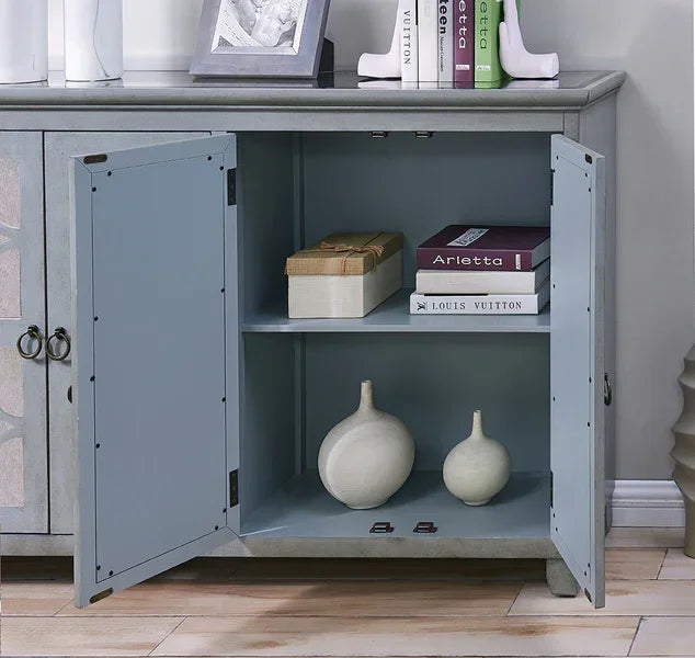 Grey wooden sideboard cabinet with double doors open showing shelves and decorative storage