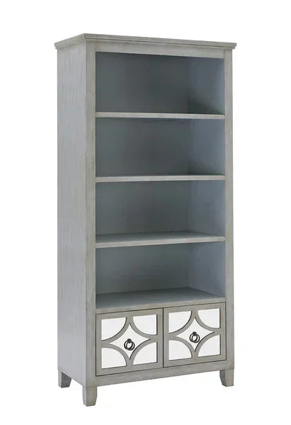 Grey wooden bookcase with four open shelves and mirrored drawers at the base