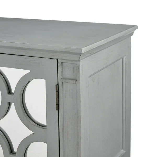 Grey wooden cabinet corner with mirrored door and geometric detailing
