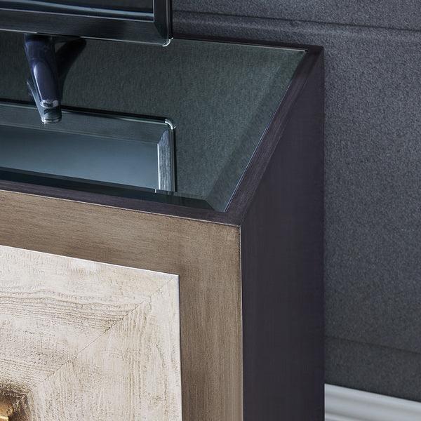 Wooden sideboard with black glass top and decorative panel detail