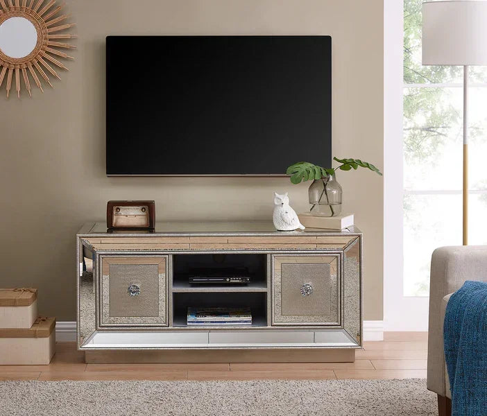 Mirrored TV unit with two doors, glass decor, and shelves in modern living room setting