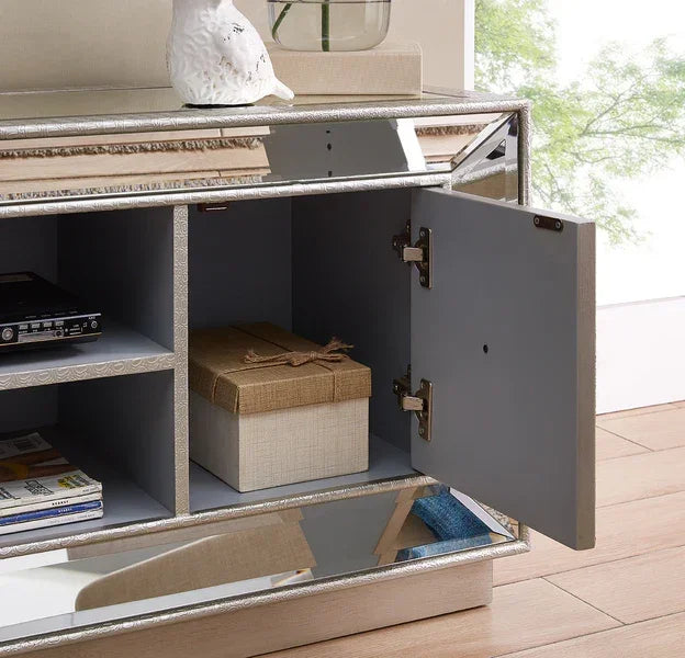 Mirrored sideboard cabinet with open door showing shelves and storage compartments