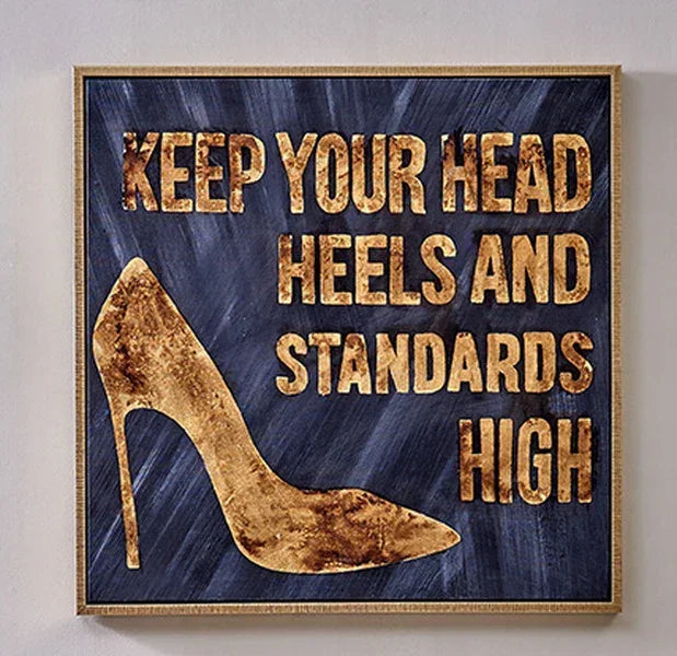 Gold high heels wall art with quote on navy blue background
