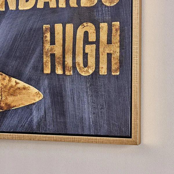 Gold text wall art with wooden frame on neutral wall