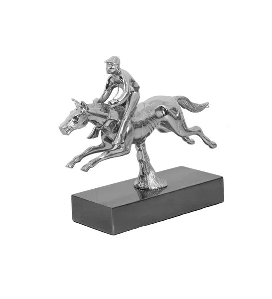 Silver horse and jockey ornament on black rectangular base