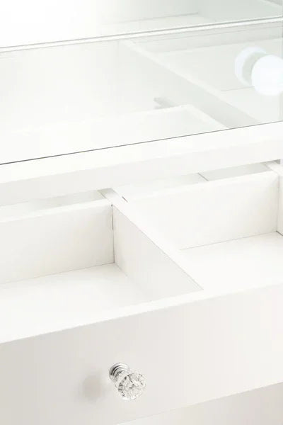 White dressing table drawer with glass top and crystal handle, divided storage compartments