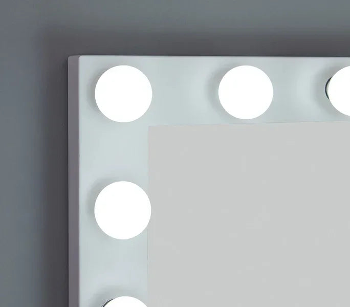 closeup of rectangular dressing table mirror with white LED bulbs in frame