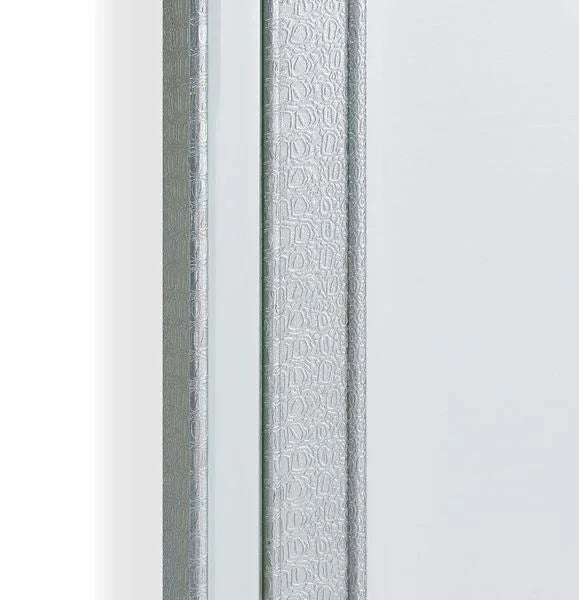 Close up of silver textured frame on white furniture panel