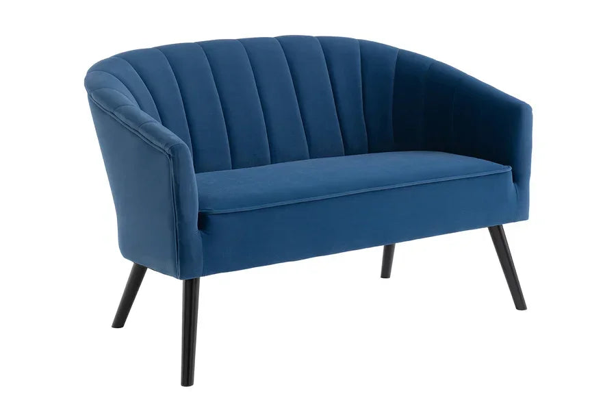Blue velvet two-seater sofa with curved backrest and black angled legs