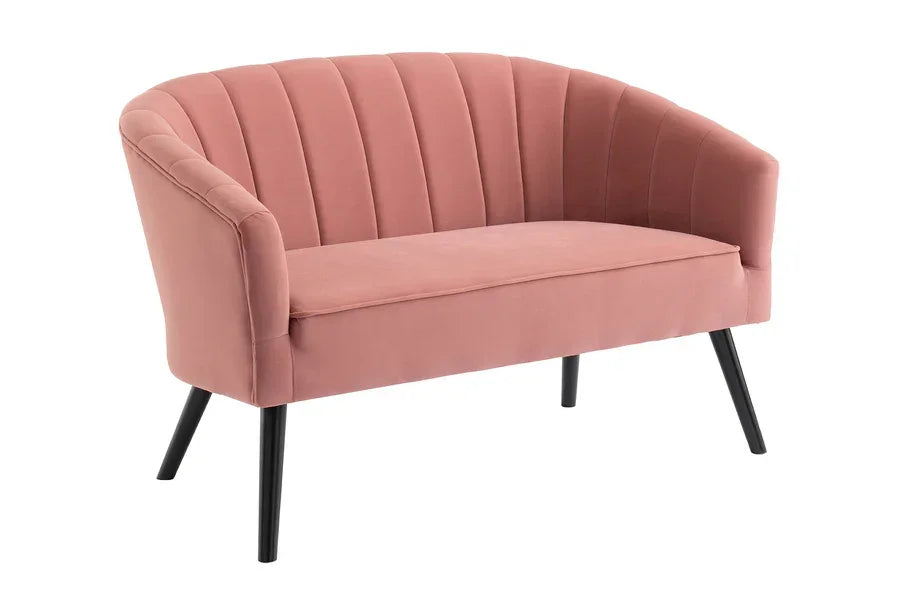 Blush pink velvet loveseat sofa with channel tufted back and black angled legs