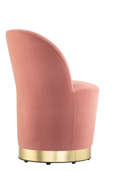 Dusky pink velvet accent chair with curved back and gold base, side view