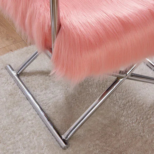 Pink faux fur dining chair with chrome legs on cream rug