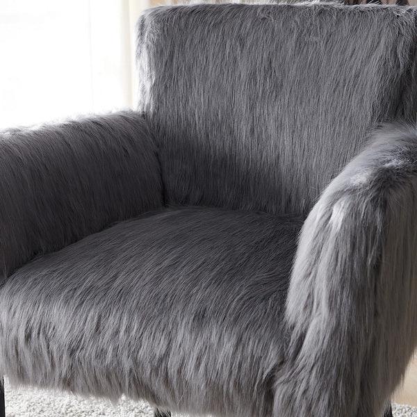 Grey faux fur armchair with soft texture and padded seat