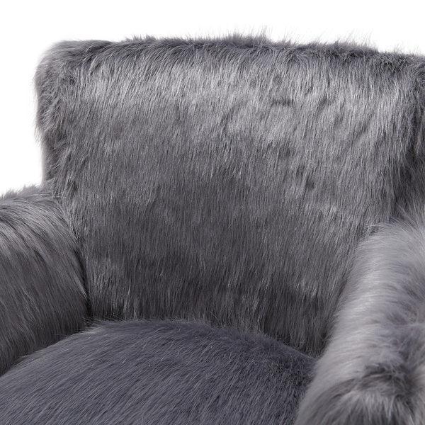 Close view of grey faux fur armchair upholstery and backrest detail