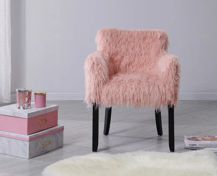 Pink faux fur accent chair with black legs in modern living room