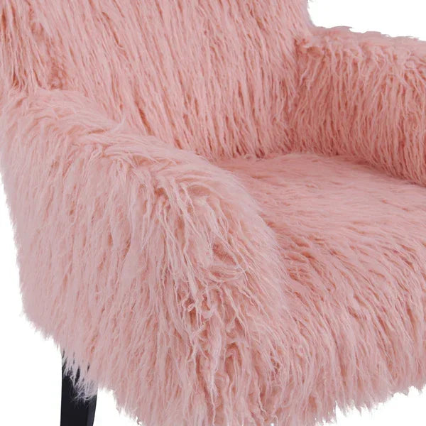 Blush pink faux fur armchair with textured upholstery and black legs