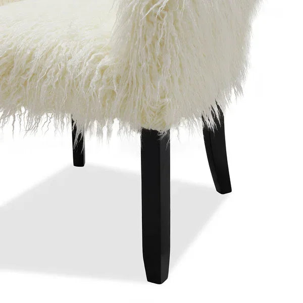 White faux fur accent chair with black wooden legs, angled side detail view
