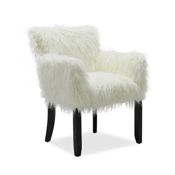 White faux fur accent chair with black wooden legs, angled armrests and plush seat