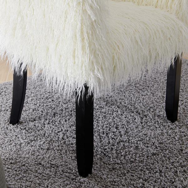 White faux fur dining chair with black wooden legs on a grey textured rug