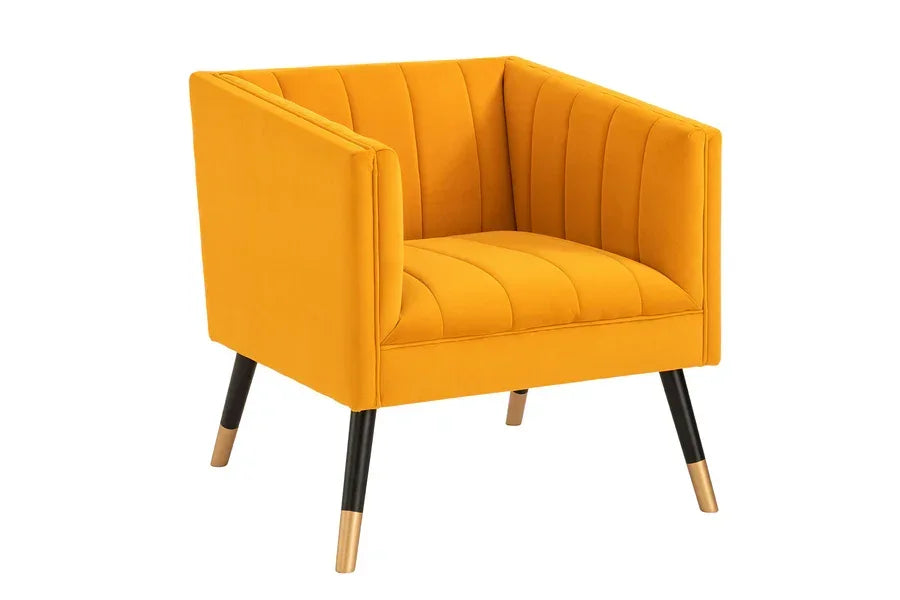 Yellow velvet accent chair with vertical stitching and tapered black and gold legs