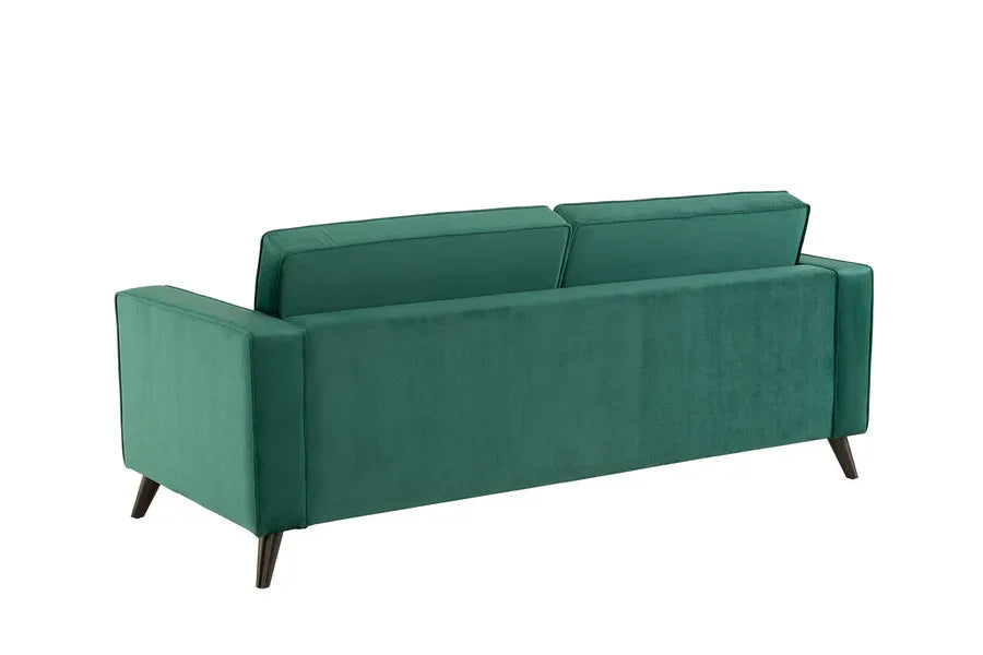 Green velvet sofa with wooden legs, rear view, showcasing modern furniture design