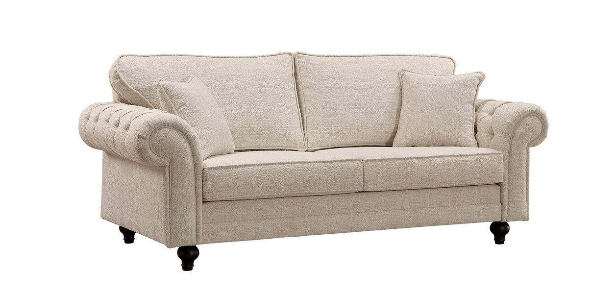 Beige fabric sofa with tufted rolled arms, two seat cushions, and matching scatter cushions
