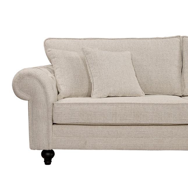 Beige fabric sofa with rolled arm and two matching scatter cushions, front angle view