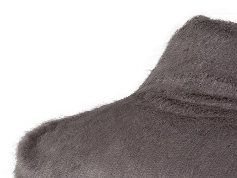 Close-up of grey faux fur bean bag chair texture