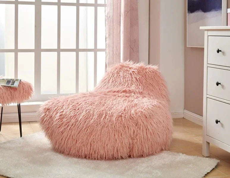 Pink faux fur accent chair on white rug in modern living room
