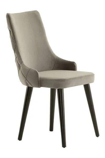 Grey velvet dining chair with stitched backrest and black legs side angle
