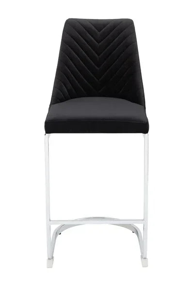 Black velvet bar stool with chrome legs and chevron stitched backrest, front view