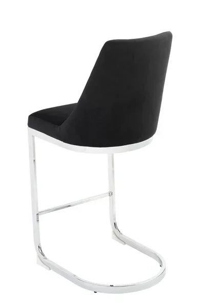 Black dining chair with chrome cantilever frame, rear angle view