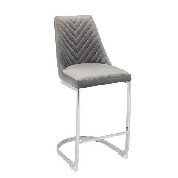 Grey velvet bar stool with chevron stitched backrest and chrome cantilever base