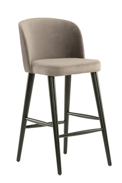 Grey velvet bar stool with black metal legs and low backrest, angled front view