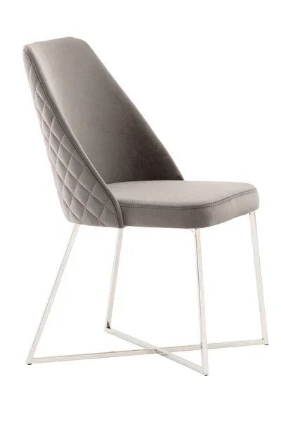 Grey velvet dining chair with quilted backrest and chrome metal legs side view