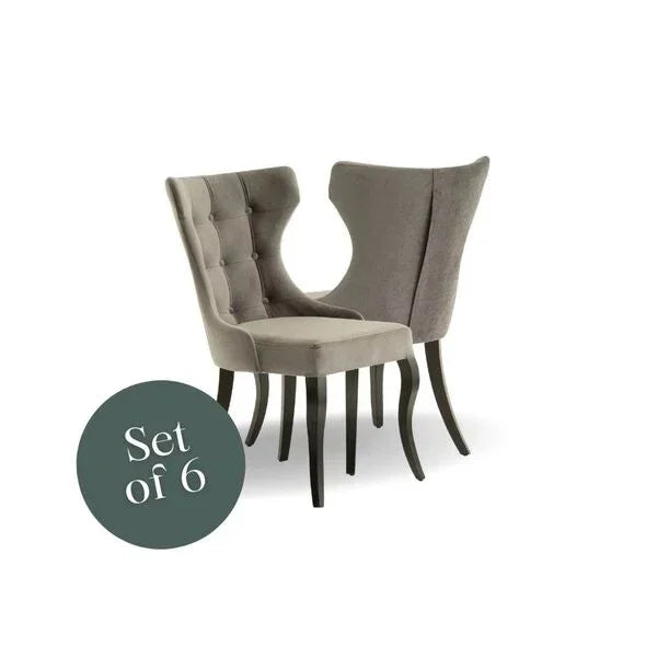Set of 6 grey velvet dining chairs with button tufted backs and dark wooden legs