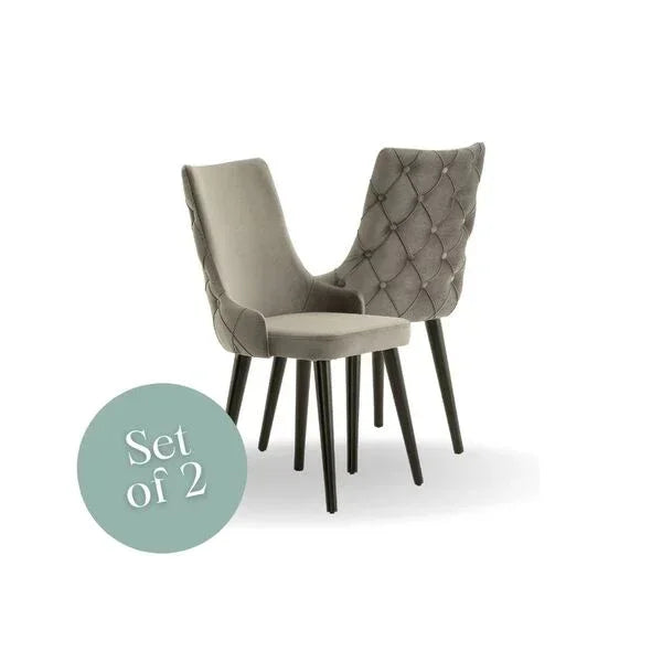 Pair of grey velvet dining chairs with diamond stitching and black legs, set of two