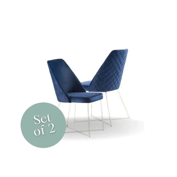 Set of 2 blue velvet dining chairs with white metal legs and quilted backrest detail