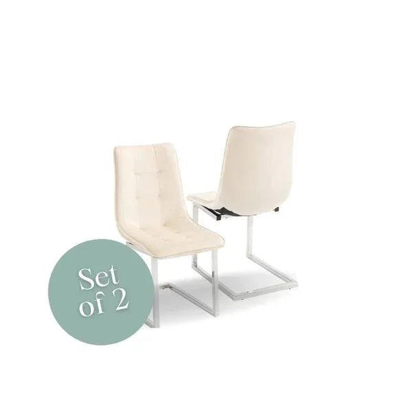 Pair of cream dining chairs with chrome cantilever legs, shown from front and back