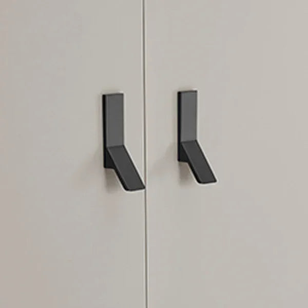 black modern wardrobe handles on cream cabinet doors