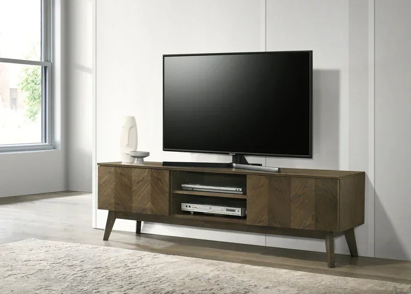 Walnut wood TV unit with chevron doors, flat screen TV, and media storage shelves